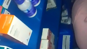 Intimate Encounter In A Pharmacy Amidst Medical Supplies